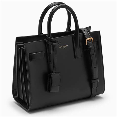 ysl tasche klein schwarzes logo|TASCHEN .